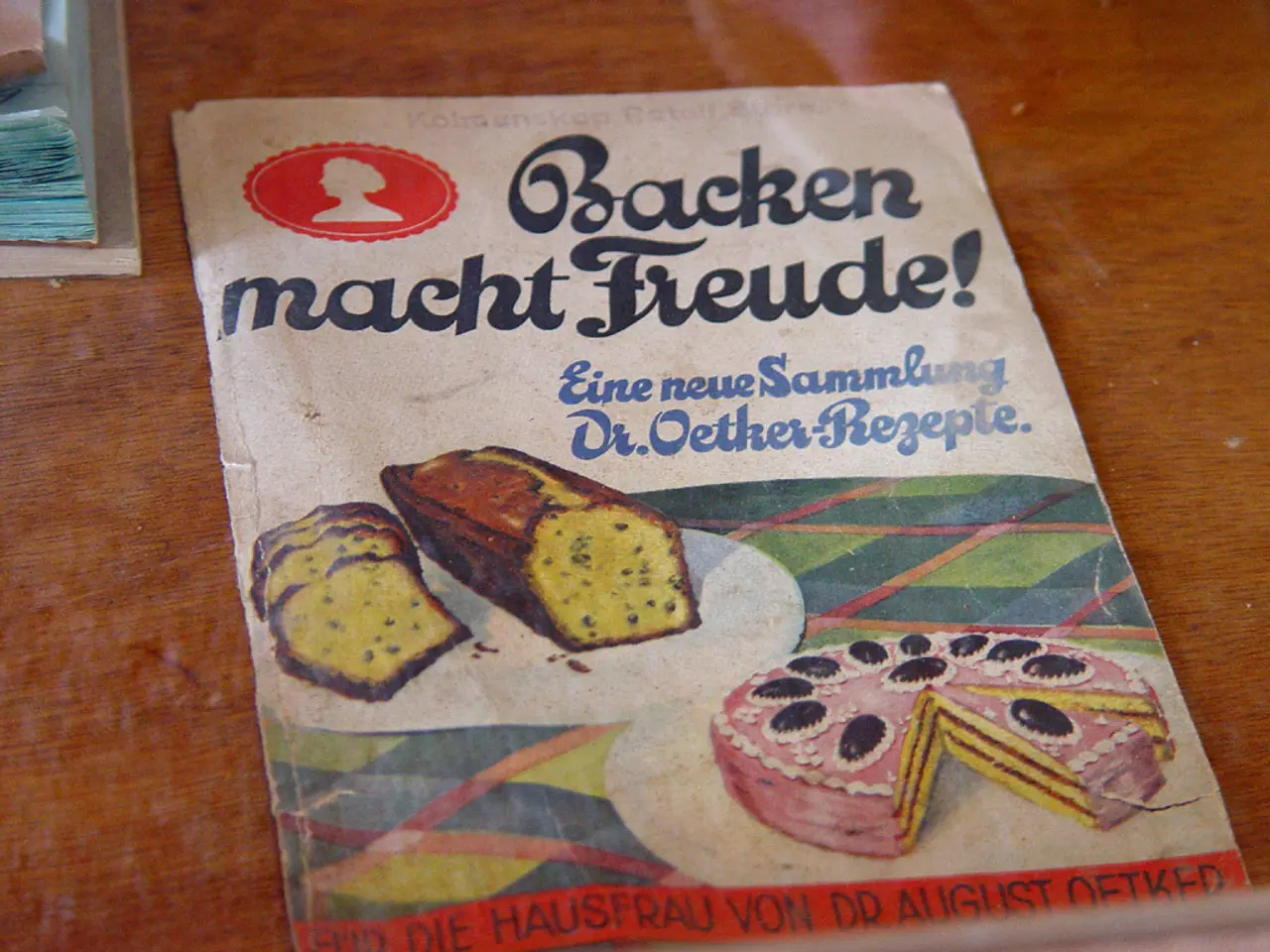 In the picture I can see a poster which is attached on the surface on which there is some bread and...