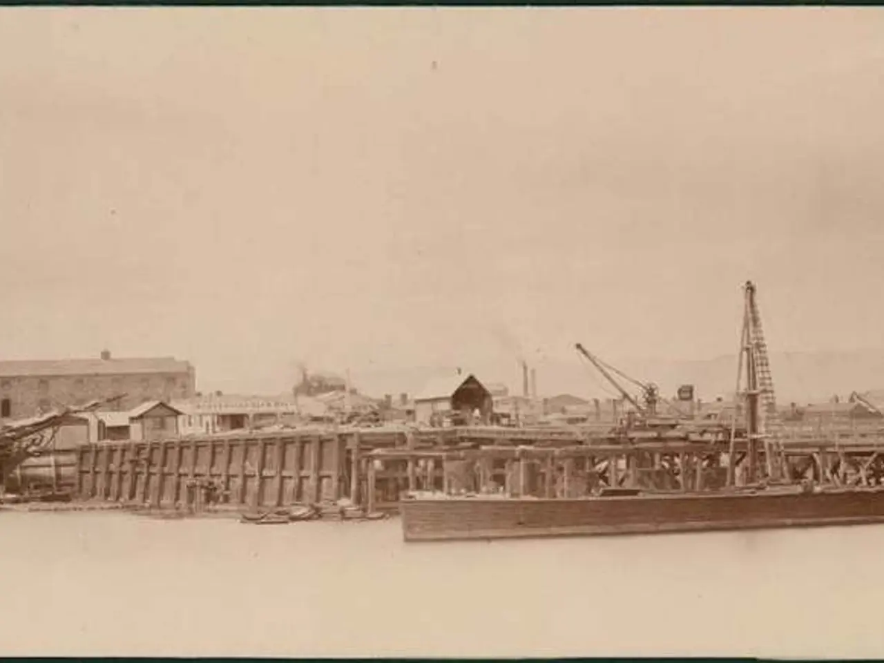 As we can see in the image there is water, boats, buildings, current poles and sky.
