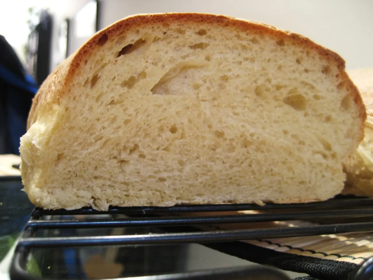 Here in this picture we can see a piece of baked item present over a place.