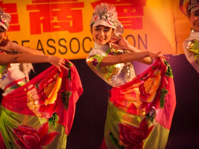 Youngstersfrom the SSV community perform a celestial dance, symbolizing the sun, in their hearts.