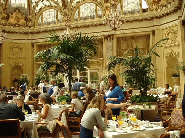 Gathering of senior officials featuring a seated dance performance