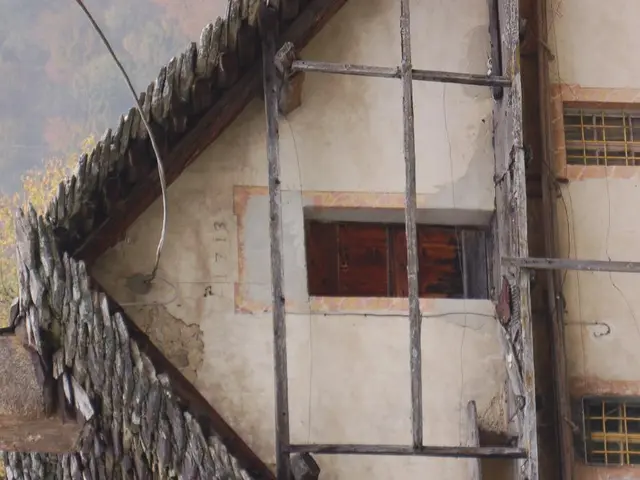 This image consists of a building. This looks like a painting. It has stairs and windows.