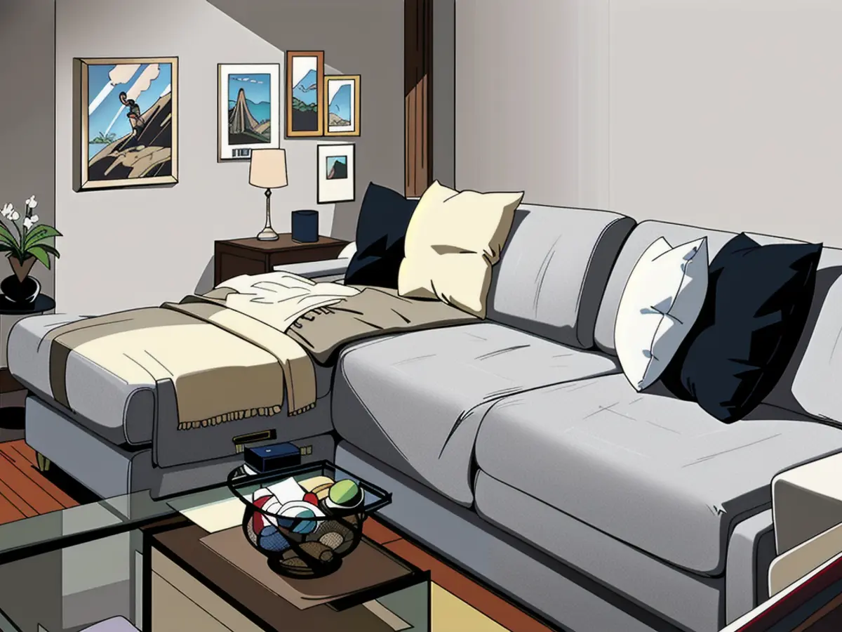 Cozy contemporary living room featuring a gray sectional, vibrant pillows, and a plush throw. A transparent coffee table showcases a lit candle and a remote. Cozy contemporary living room featuring a gray sectional, a variety of cushions, and a cozy throw. A glass-topped coffee table displays a lit candle and a TV remote.